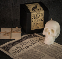 Load image into Gallery viewer, The Curious Skulls of Corvus Creek Candle - The Upturned Cauldron