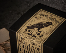 Load image into Gallery viewer, The Curious Skulls of Corvus Creek Candle - The Upturned Cauldron