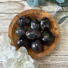 Load image into Gallery viewer, Arfvedsonite Garnet Cuddle
