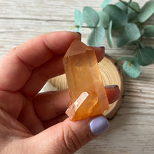 Load image into Gallery viewer, Raw Specimen: Tangerine Seed Lemurian Point
