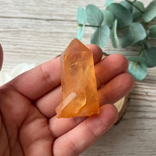Load image into Gallery viewer, Raw Specimen: Tangerine Seed Lemurian Point
