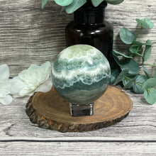 Load image into Gallery viewer, Snowflake Green Fluorite Sphere
